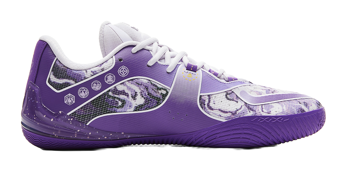 Lavender and white basketball shoe with patterned panels and white laces