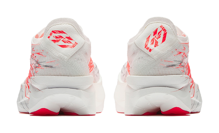 Anta women’s running shoe in white with red heel details and red graphic accents