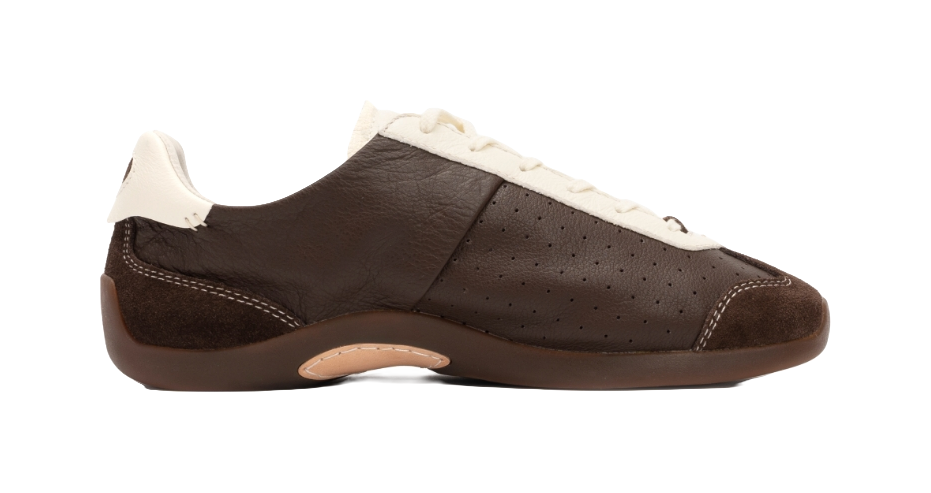 Brown low-top sneakers with antique white laces, suede toe trim, and perforated vamp.