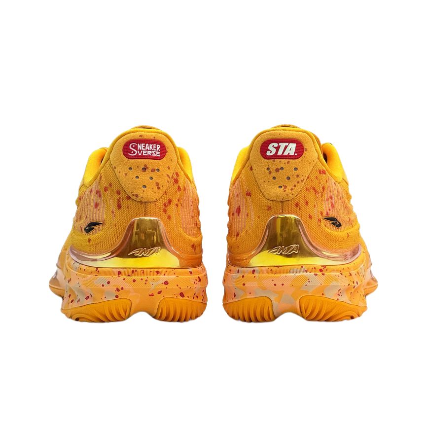 Unisex low-top basketball sneaker, back view: yellow heel with STA patch and speckles