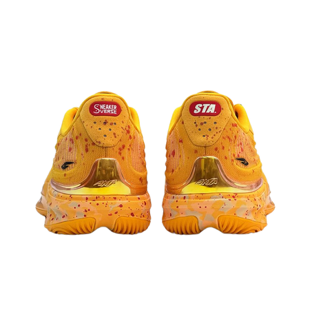 Unisex low-top basketball sneaker, back view: yellow heel with STA patch and speckles