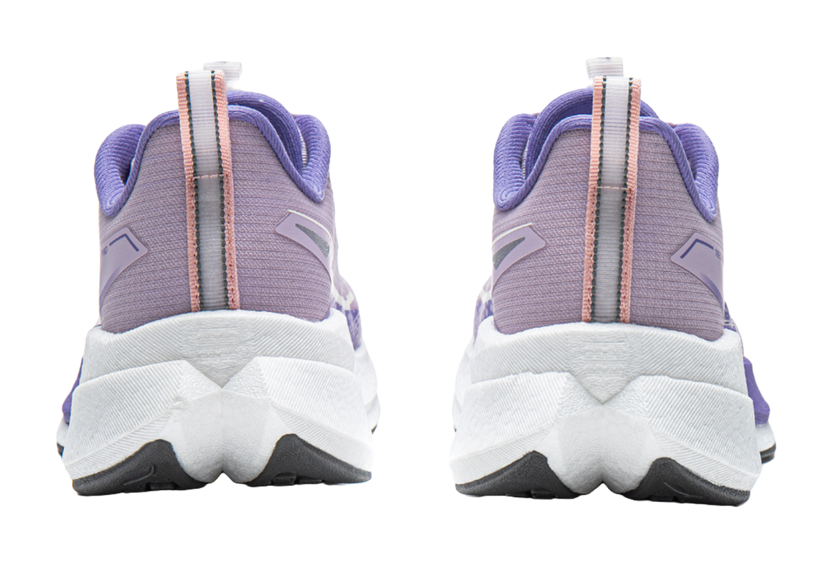 Pair of lavender purple running shoes with white midsoles and orange-striped heel straps