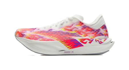 Unisex running shoe with white upper and multicolor glitter splash