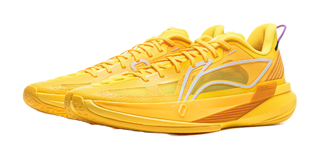 Yellow basketball shoe with white curved side stripe and cushioned sole