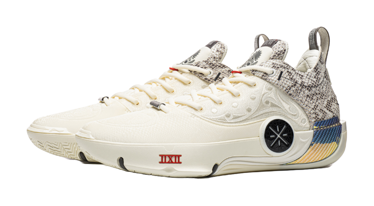 Ecru mid-top basketball shoe with speckled heel panel, lace-up and cushioned sole