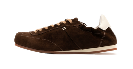 Women's dark brown suede low-top casual shoes with white heel trim and lace-up front