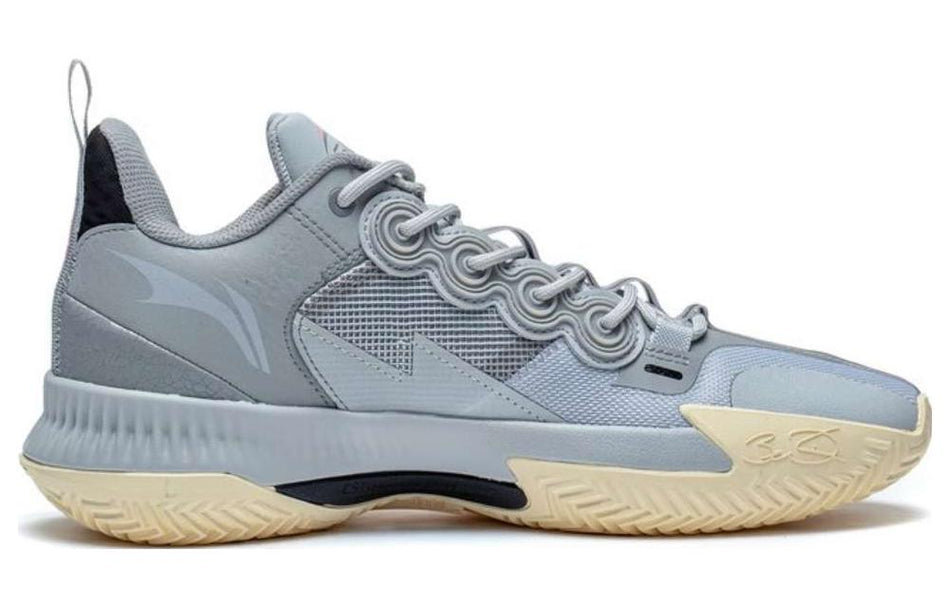 Men's basketball shoe side view in light grey with cream outsole and lace-up design