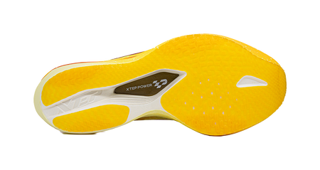 Racing shoe outsole with yellow textured tread and XTEP POWER logo, white details.