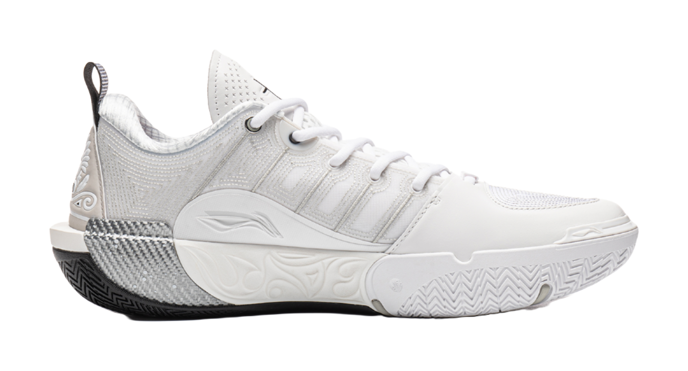 White basketball shoe side view with textured midsole and ankle collar