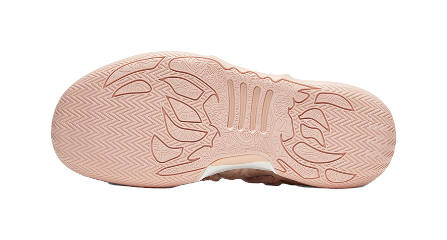 Soft pink basketball shoe outsole with herringbone grip tread pattern