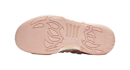 Soft pink basketball shoe outsole with herringbone grip tread pattern