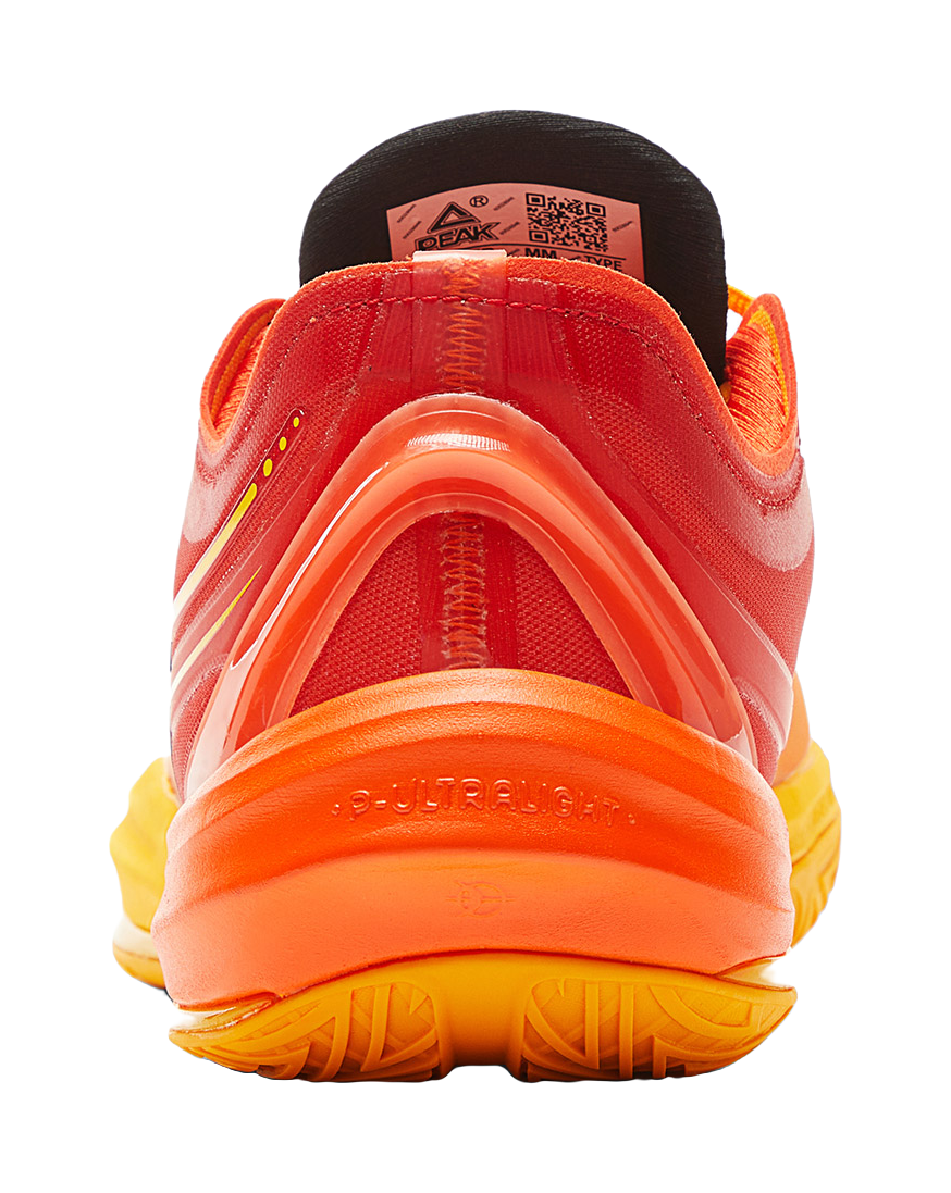 Basketball shoe heel with orange outsole, cushioned back, and PEAK branding patch