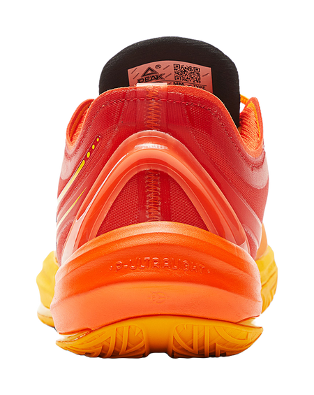 Basketball shoe heel with orange outsole, cushioned back, and PEAK branding patch