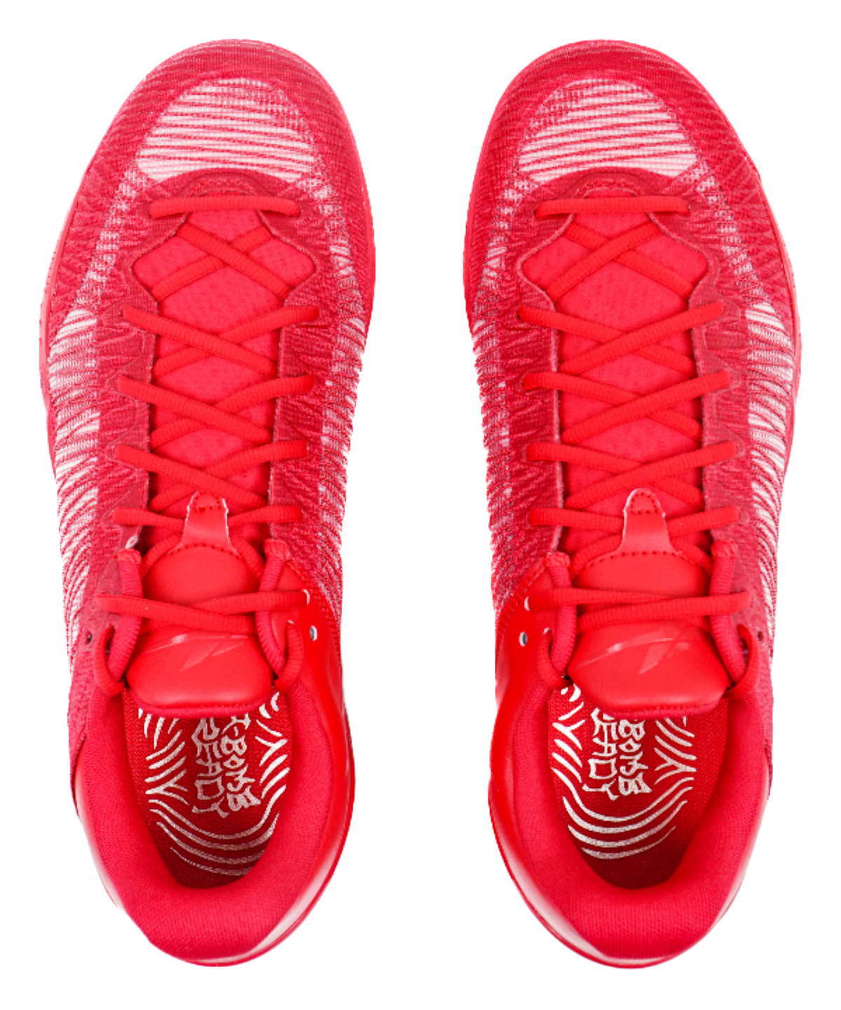 Red basketball shoes shown from toe area with patterned sockliner and laces