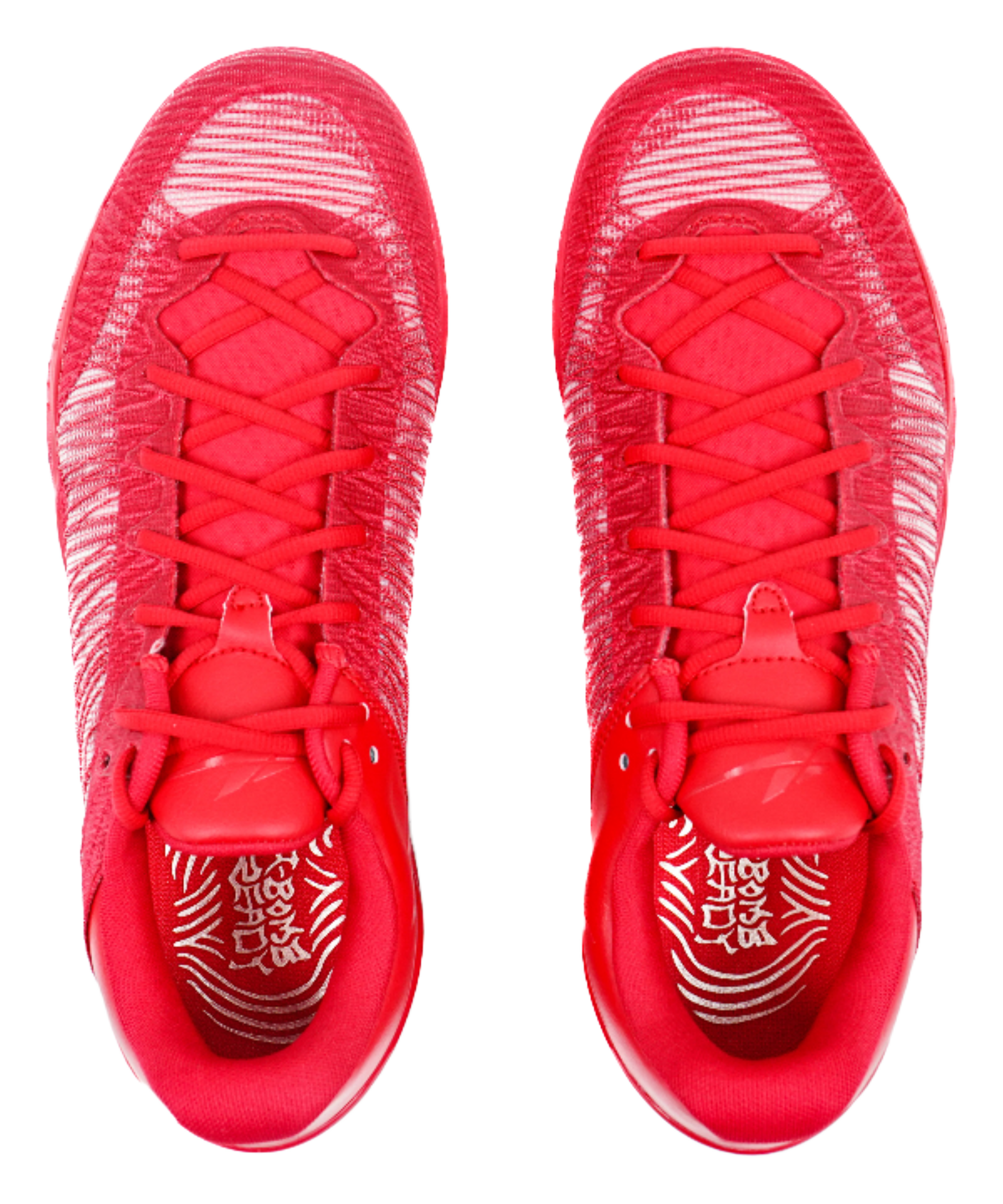Red basketball shoes shown from toe area with patterned sockliner and laces