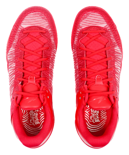 Red basketball shoes shown from toe area with patterned sockliner and laces