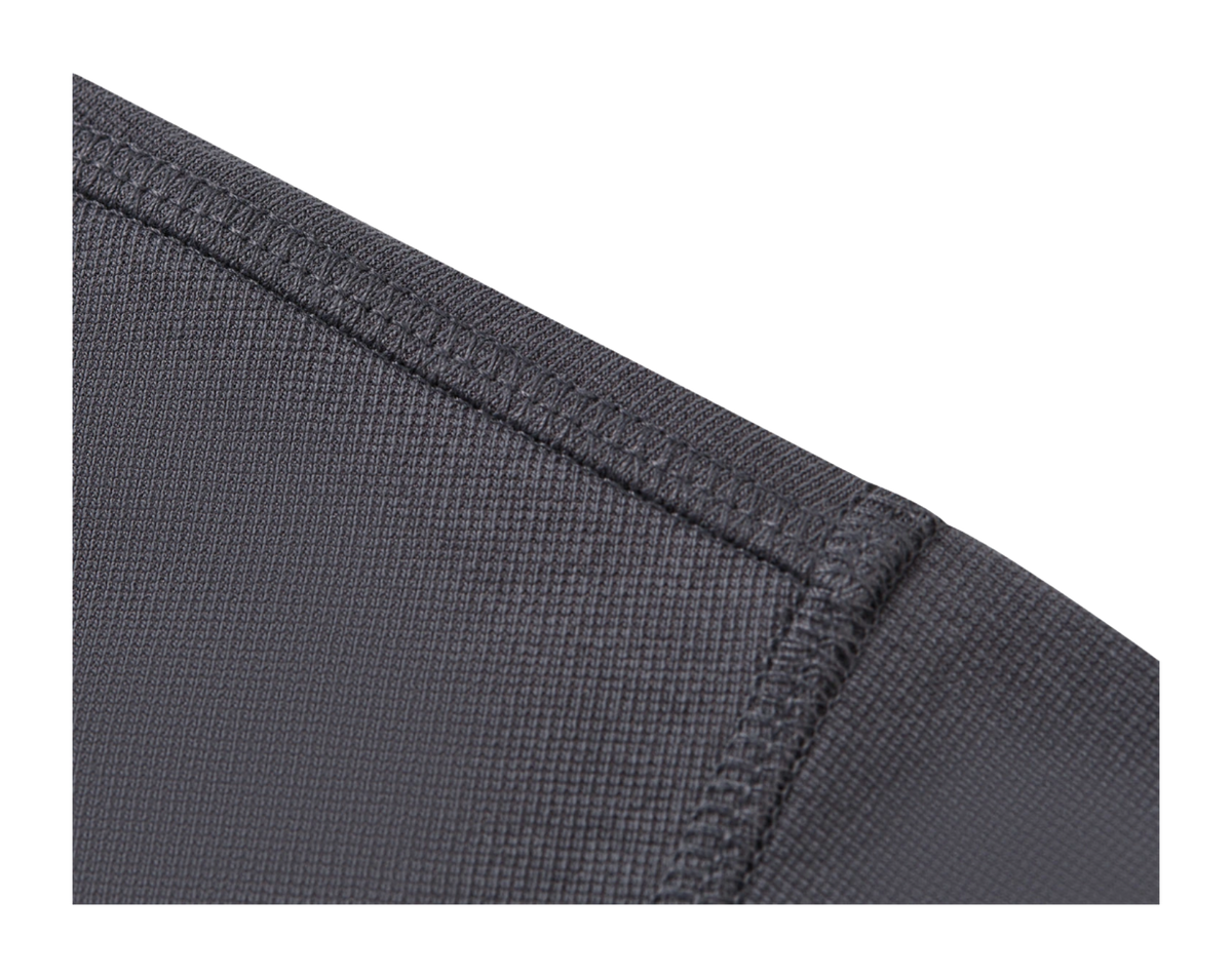 Gray T-shirt side seam and hem stitching close-up