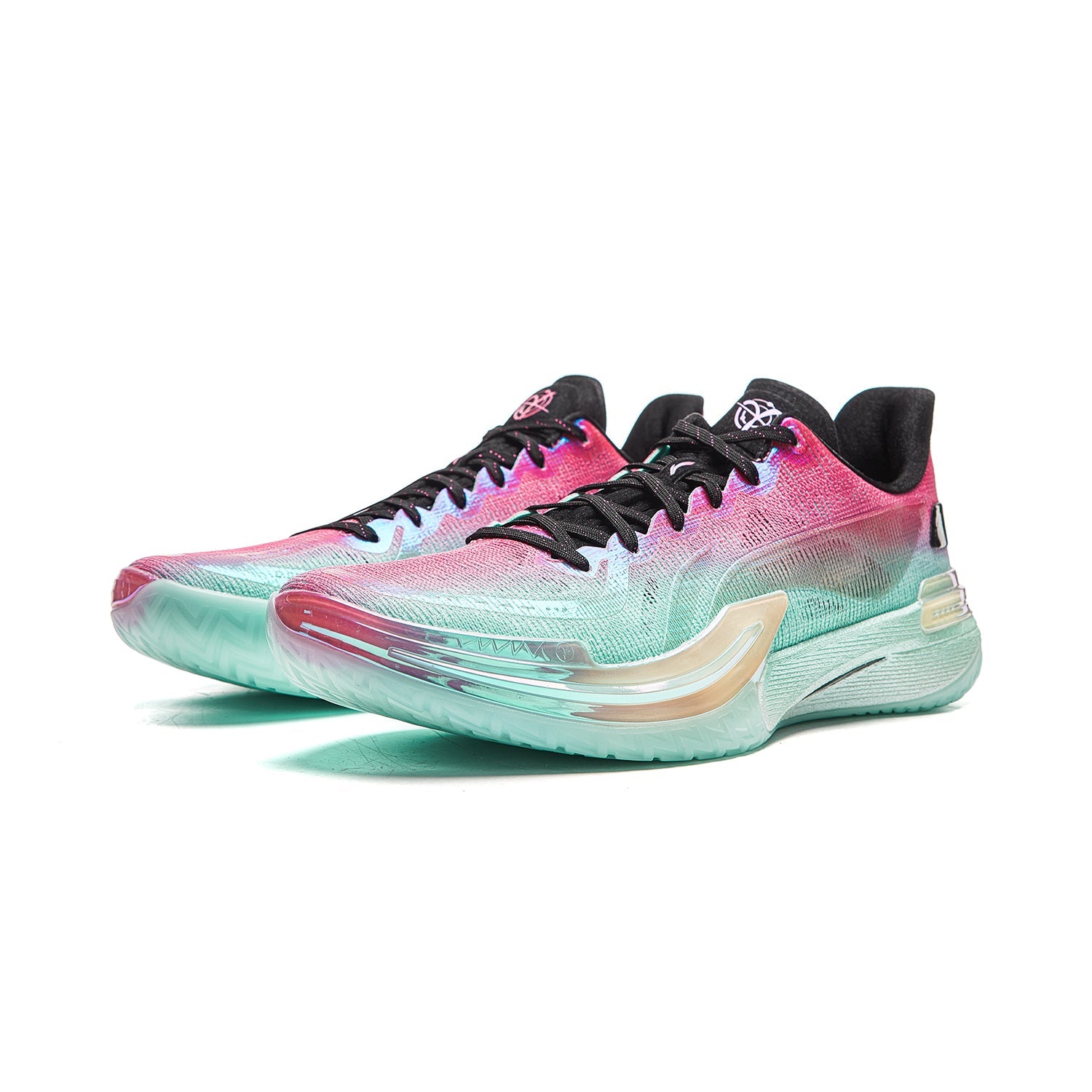 Pair of unisex basketball shoes with pink knit uppers, black laces, and mint midsole.