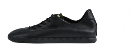 Black low-top training sneaker, side view, black laces and leather upper