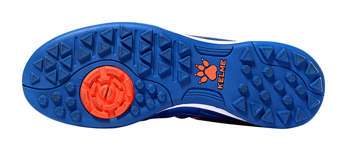 Kelme royal blue outsole with red traction insert and stud tread for turf