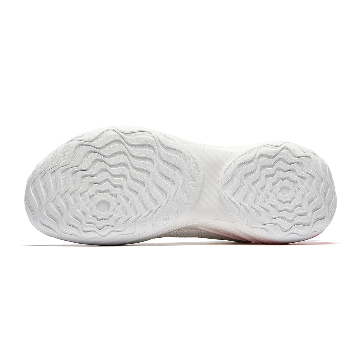 Basketball shoe outsole with white traction tread and circular grip pattern