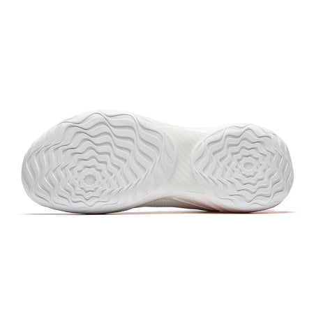Basketball shoe outsole with white traction tread and circular grip pattern
