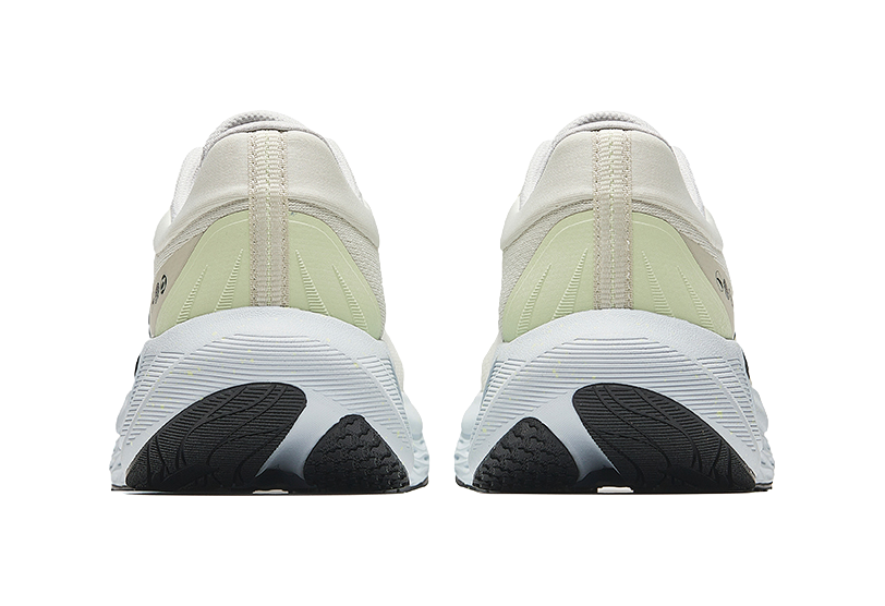 Men's low-top running shoe heels, cream uppers with light-blue midsole and black tread pods