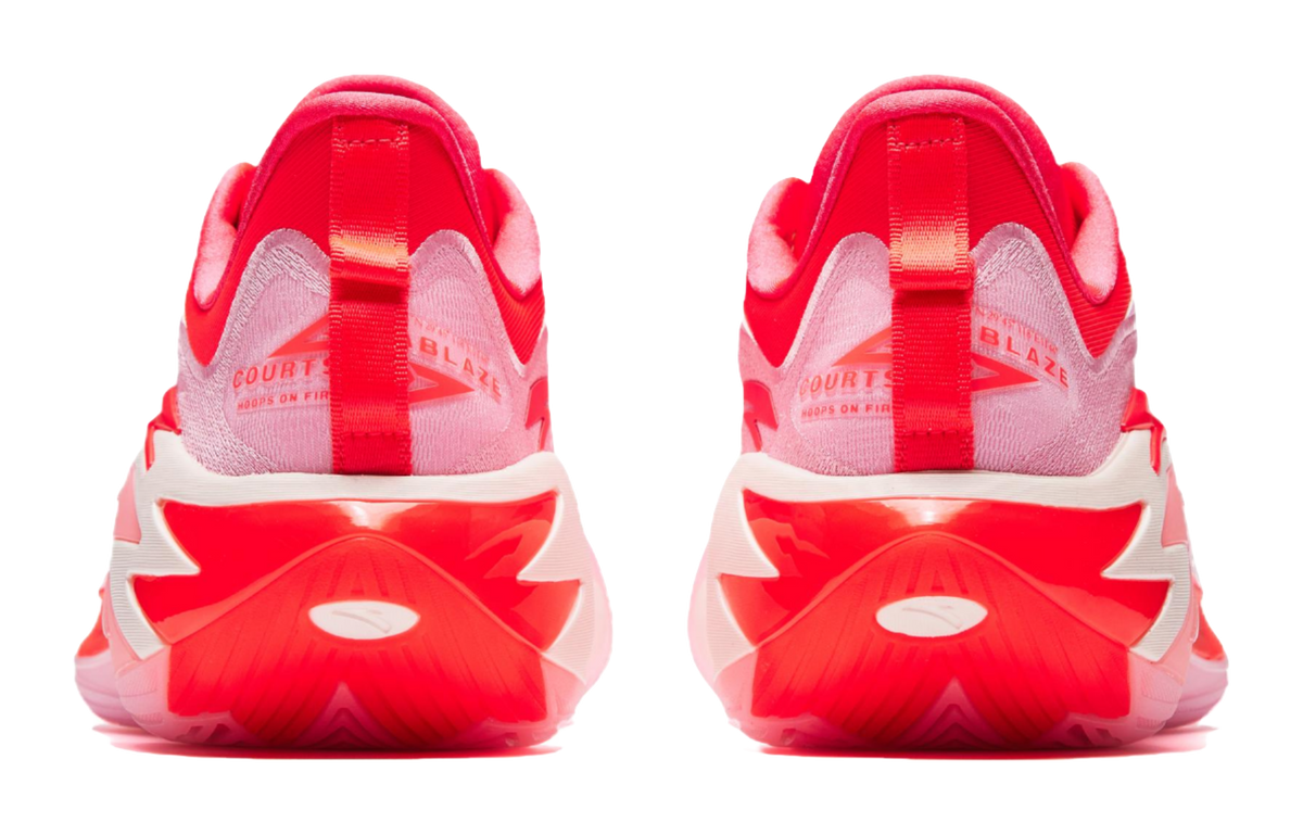 Pink and red basketball shoes heel view with molded outsole and branding on back