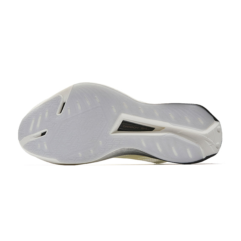 Marathon racing shoe outsole with light rubber tread and molded traction pattern