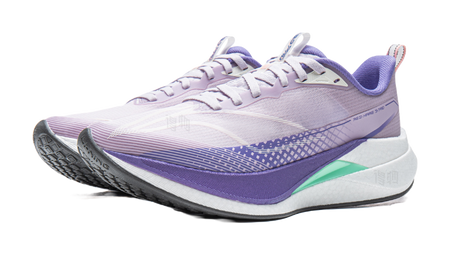 Lavender purple running shoe with white laces, purple trim, and green heel accent