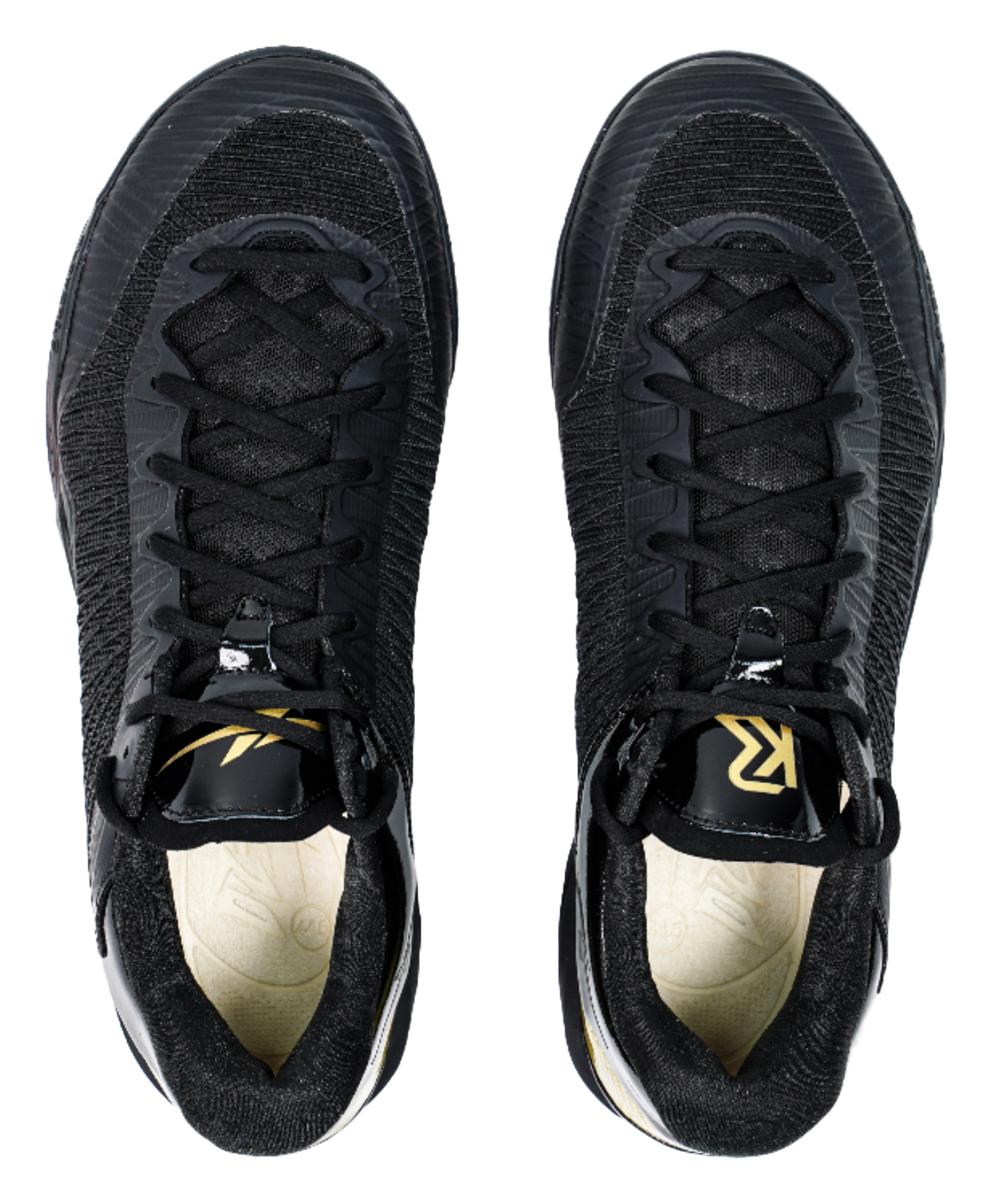 Pair of black lace-up basketball shoes showing front toe and laces with yellow accents