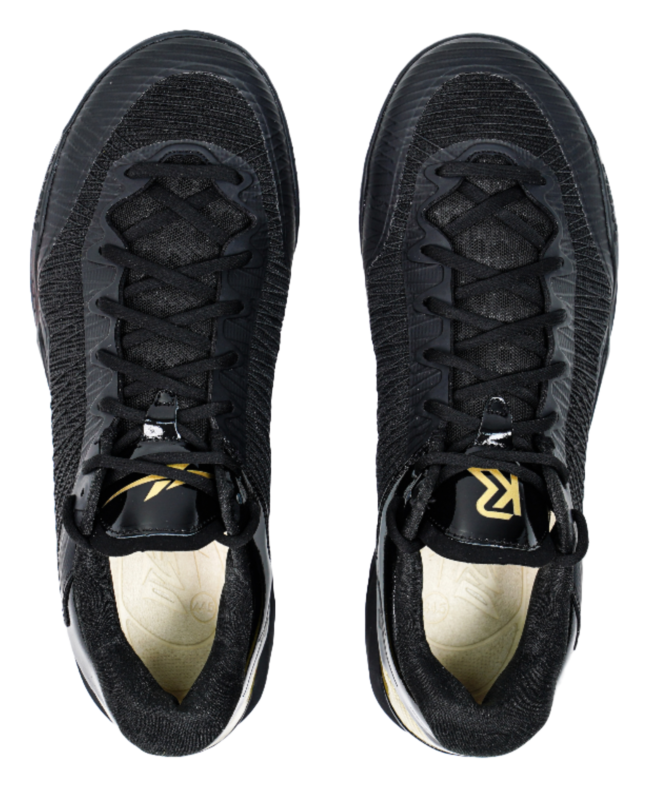 Pair of black lace-up basketball shoes showing front toe and laces with yellow accents