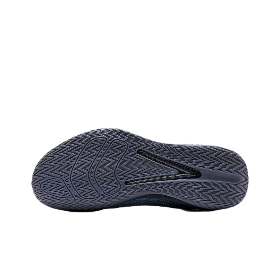 Basketball shoe outsole with zigzag traction pattern, dark blue and gray.