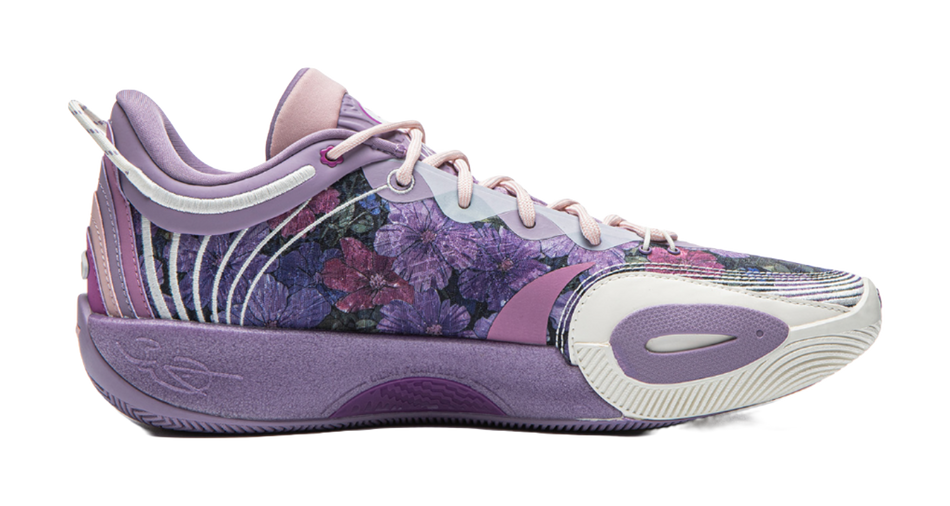 Purple basketball shoe side view with floral upper and light outsole details.