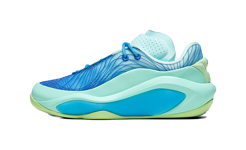Men's blue lace-up basketball shoe with aqua sole and textured side panel