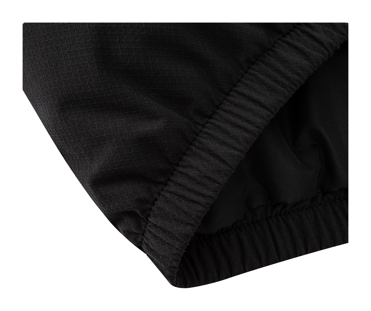Black puffer down jacket quilted shoulder and ribbed hem trim, close-up