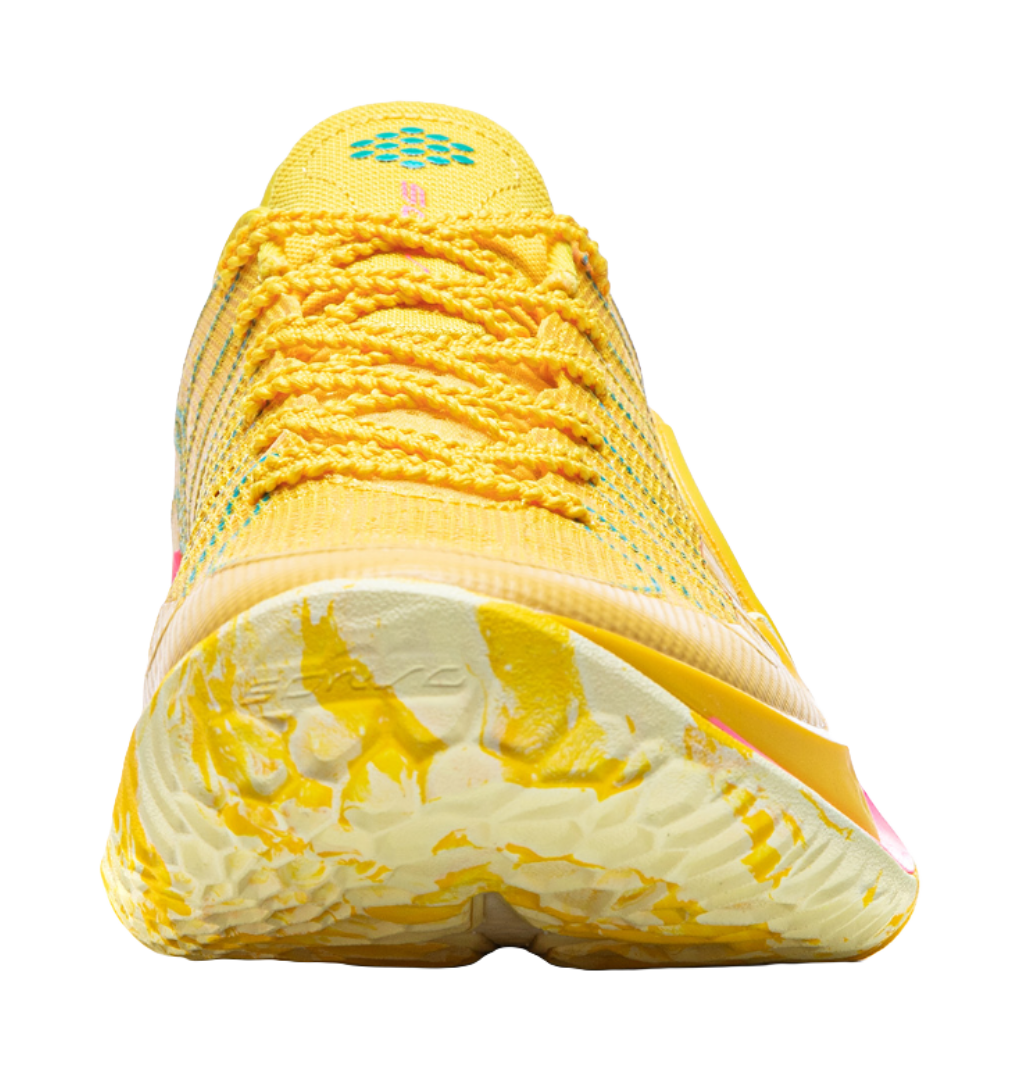 Lemon yellow heel and tread of basketball shoe with grippy outsole pattern