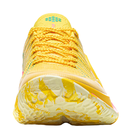 Lemon yellow heel and tread of basketball shoe with grippy outsole pattern