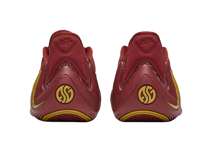 Men's low-top basketball shoes, burgundy heels with yellow side panels and logo