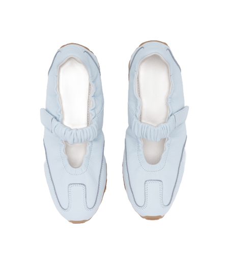 Pair of light sky blue Mary Jane low-top sneakers with elastic cuff and toe opening