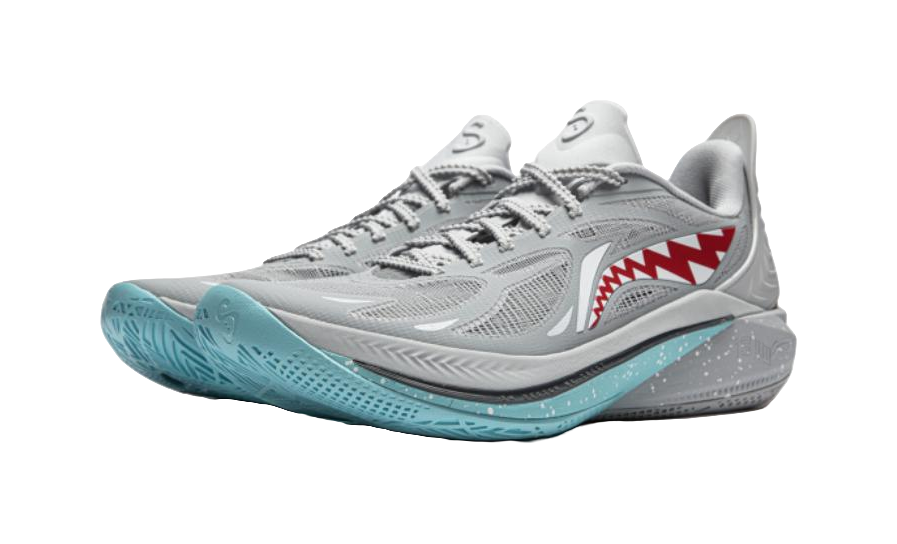 Gray basketball shoes with red shark-tooth side graphic and teal trim, lace-up