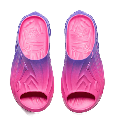 Unisex slide sandal outsole view with pink inner tread and purple outer tread