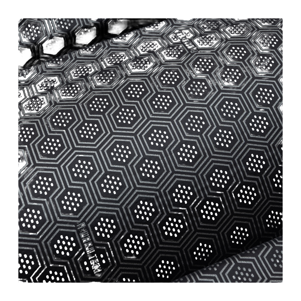 Down jacket inner lining with repeating dark geometric hexagon pattern
