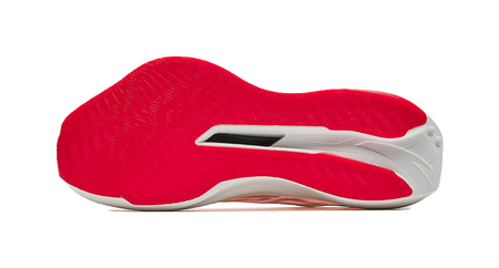Red outsole running shoe with white midsole and side ventilation panel.