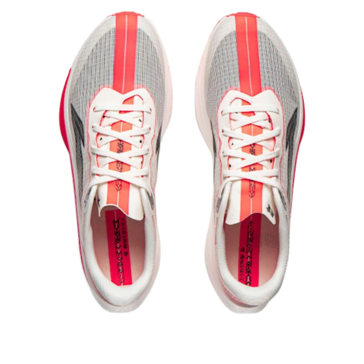 Pair of running shoes with white laces, red-lined tongue, and breathable mesh upper