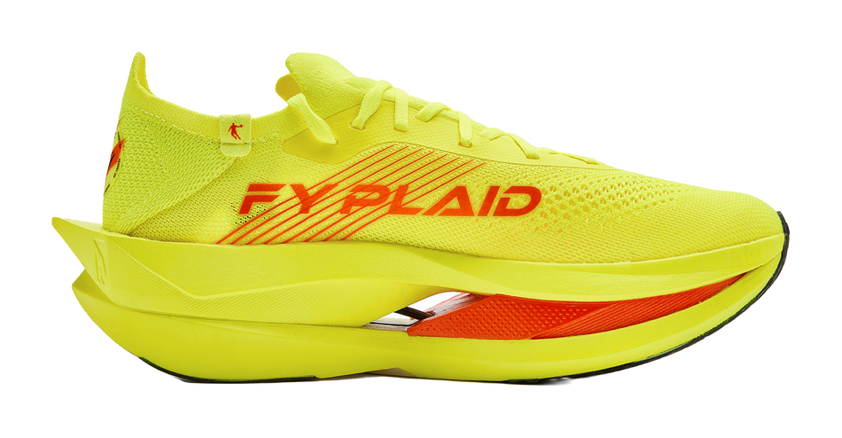 Bright yellow sneaker with FXAIR text on upper and orange panel accents.