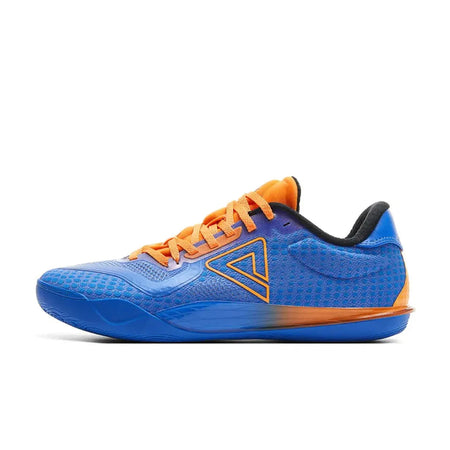 Blue basketball shoe with orange laces and black collar, rubber outsole