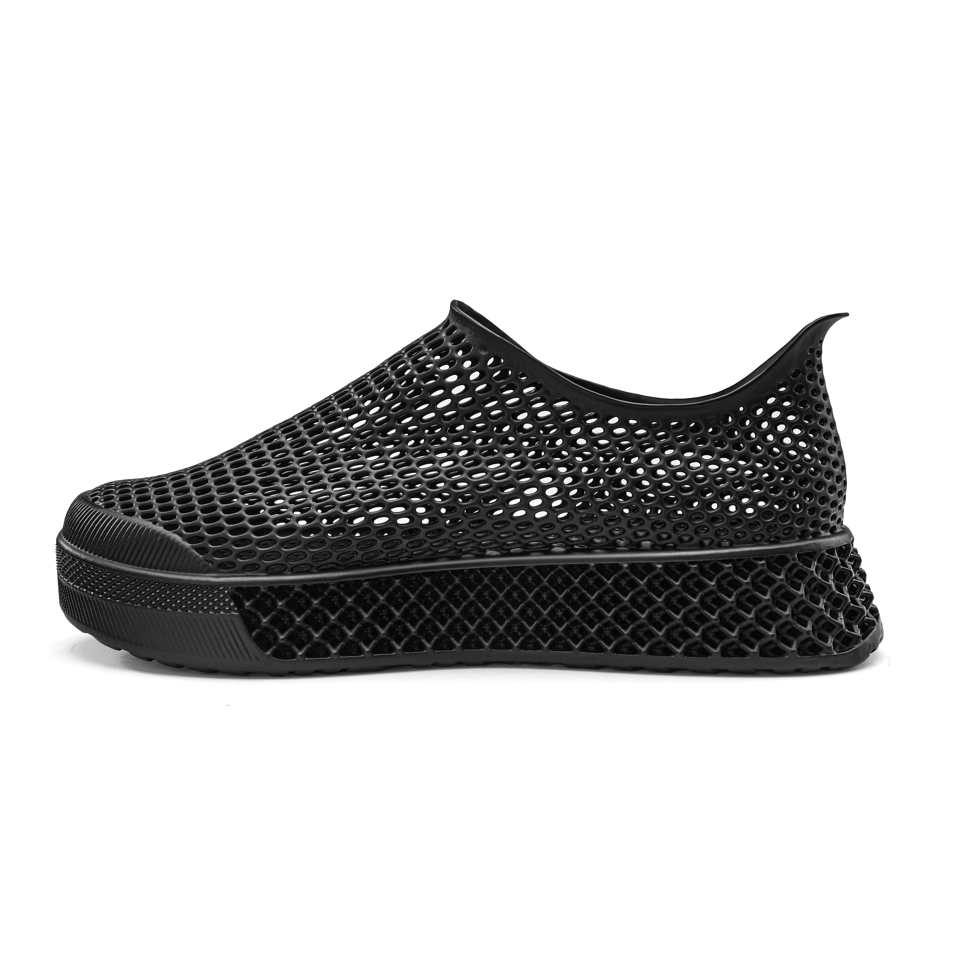 3D-printed casual sneaker in black with mesh-like upper and chunky rubber sole