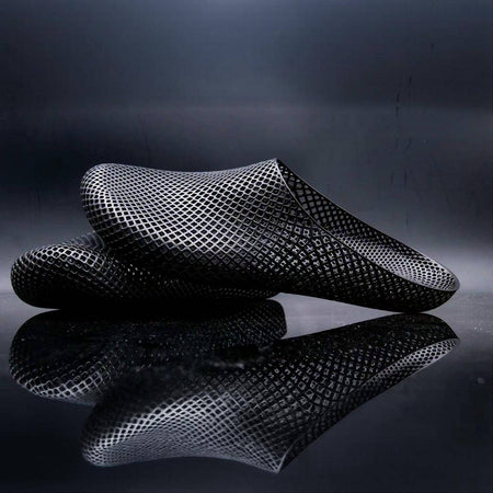 Black 3D printed slippers, low-profile slip-ons with grid-texture uppers