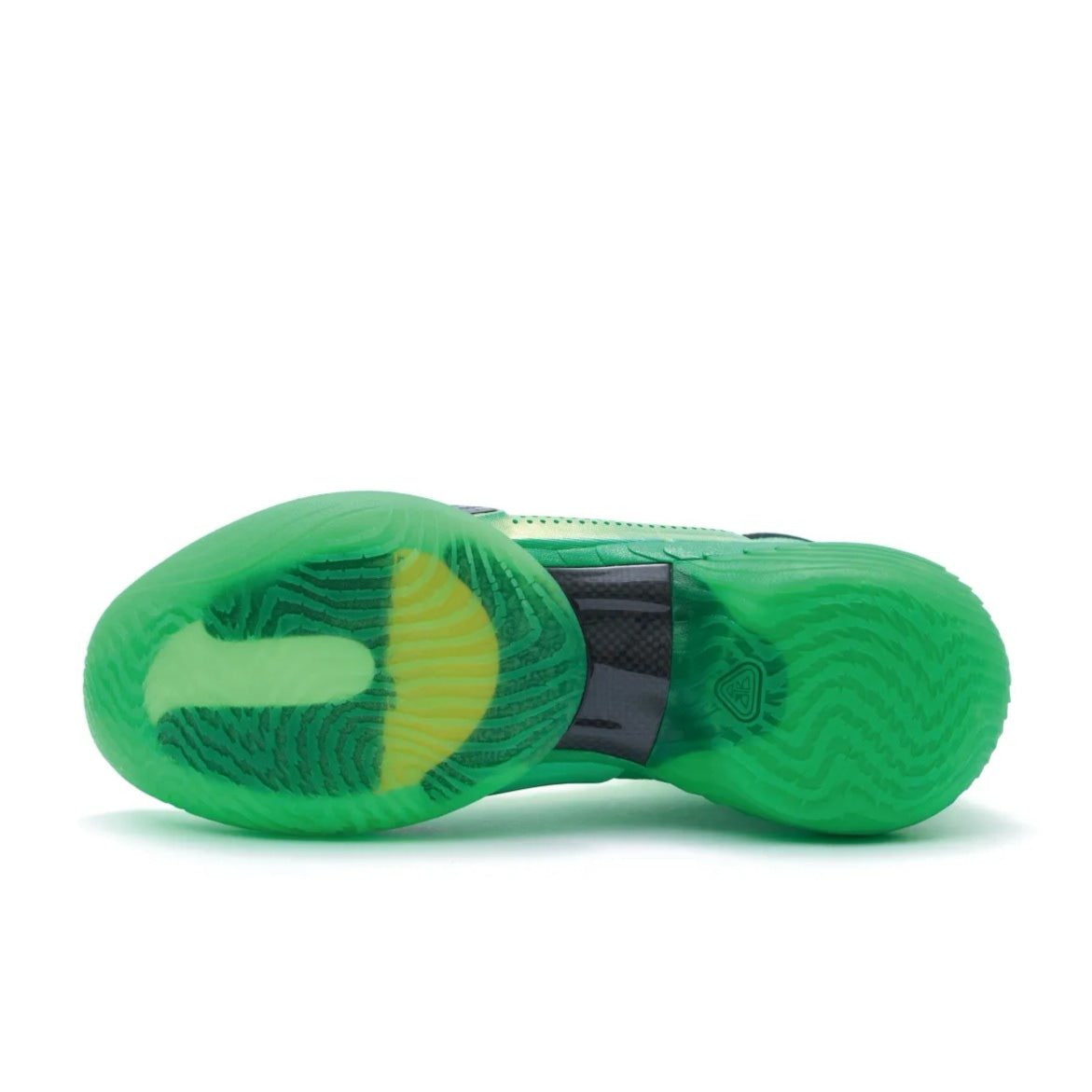 Green high-top basketball shoe outsole view with green tread and black heel panel